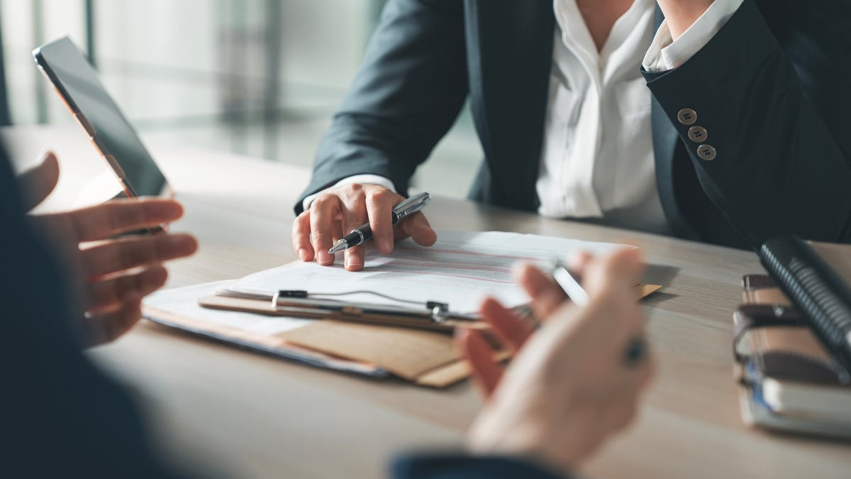 Business professionals collaborating in a bright modern office
